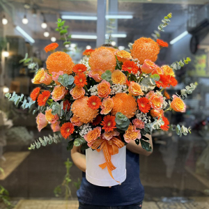 Giở hoa khai trương để bàn màu cam sang trọng