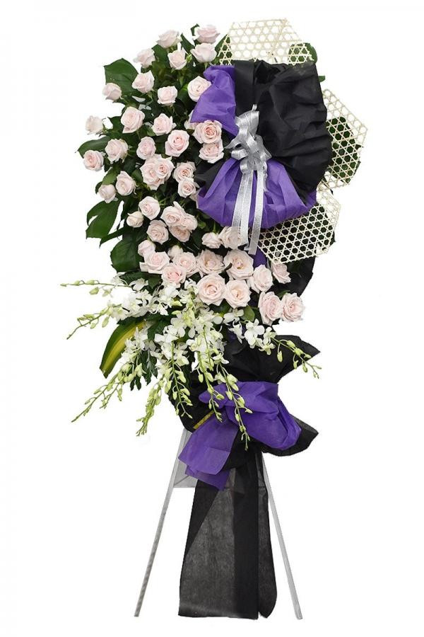 Kệ hoa hồng lan trắng giấy đen chia buồn tang lễ 1