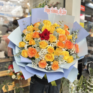 Bó hoa hồng vàng giấy xanh pastel