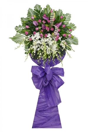 Vòng hoa tím lan trắng nơ tím chia buồn đám ma