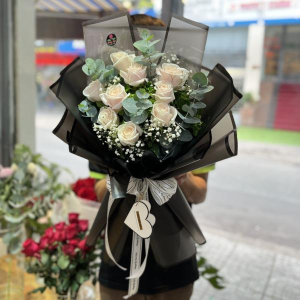 Bó hoa chúc mừng sinh nhật bạn gái hồng kem 9 bông mix baby