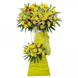 Kệ hoa khai trương tone vàng- hướng dương, hồng vàng, mõm sói, ly vàng, baby, lá